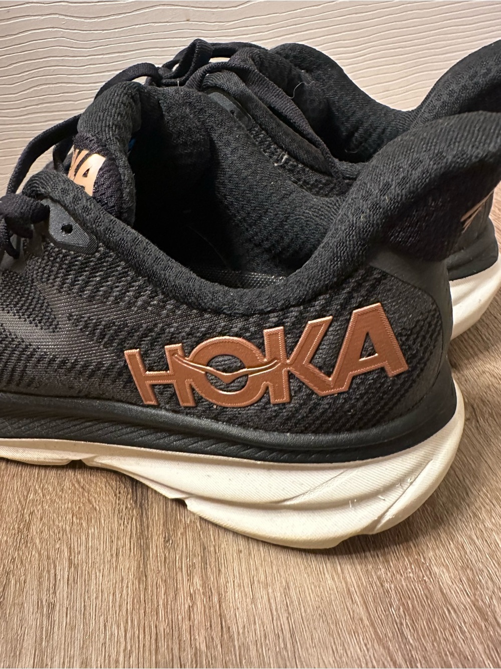 Hoka Kids Black Sneakers with Rose Gold Logo Accent